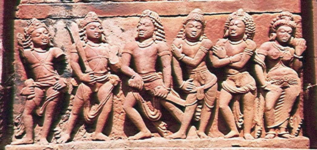The five Pandava princes- heroes of the epic Mahabharata - with their shared wife-in-common named Draupadi.
