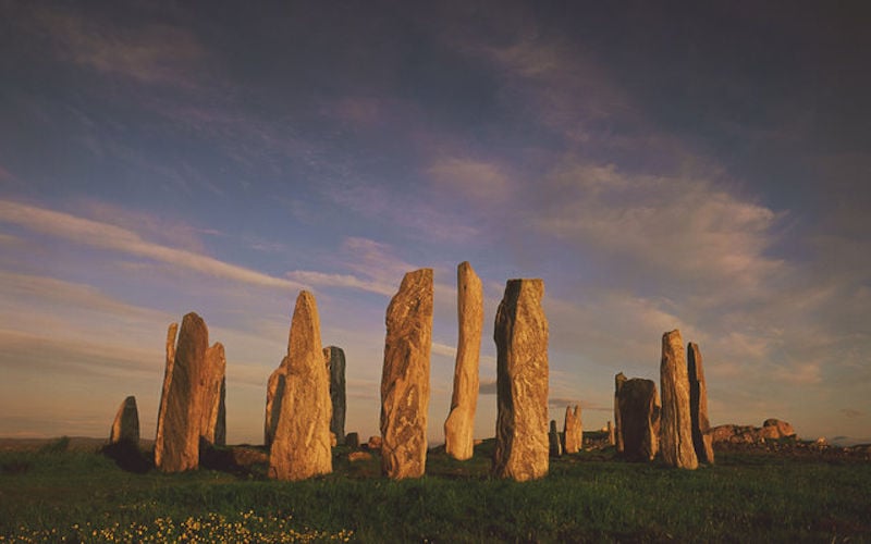 The Callanish Stones are a cruciform arrangement of Neolithic standing stones centred around a stone circle, located on the Isle of Lewis, Scotland.