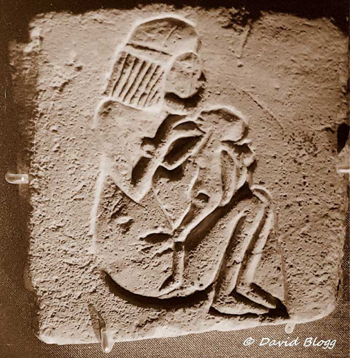 A rare limestone relief from Tell el-Amarna with a sunk relief representation of a squatting woman feeding her child. Death of newborns was commonplace in ancient Egypt. British Museum.