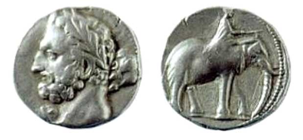 A Carthaginian shekel, dated 237-227 BC, depicting the Punic god Melqart (equivalent of Hercules/Heracles), most likely with the features of Hamilcar Barca, father of Hannibal Barca; on the reverse is a man riding an elephant. 