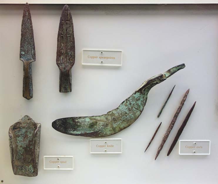 Copper knife, spear points, awls, and spade, from the Late Archaic period, Wisconsin, 3000 BC-1000 BC.