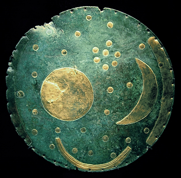 Dated to 1600 BC, The Nebra sky disk is a 30-centimeter (12 inch) diameter bronze disk weighing around 2.2 kilograms (4.9 pounds). The disc features a blue-green patina and is inlaid with gold astronomical symbols including the sun, full moon, a lunar crescent moon and a cluster of stars interpreted as the Pleiades constellation. (CC BY-SA 3.0)