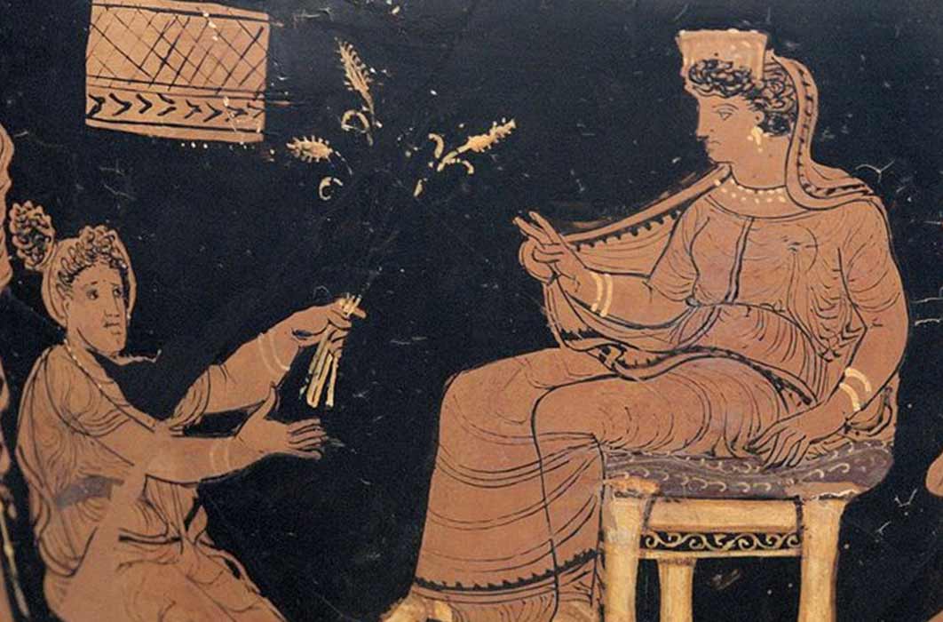 Demeter (left) handing ears of wheat to Metanire, the queen of Eleusis (Public Domain)