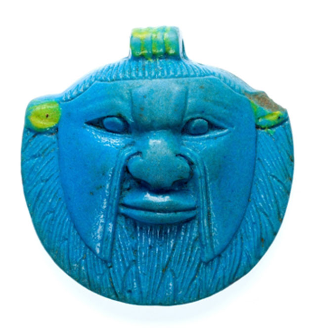 Faience amulet of the head of Bes from the Late Period, 26th to 30th Dynasties. Bes was worshipped and invoked by ordinary Egyptians as a protector. His usual depiction, as a grotesque dwarf with a lion’s ears and mane, was thought to deter the approach of the malevolent forces believed to cause illness. Metropolitan Museum of Art, New York.