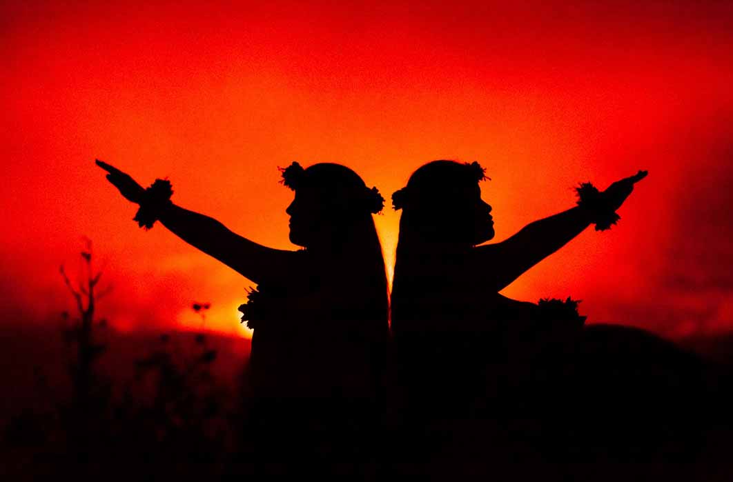  Top Image: Hawaiian girls dancing in front of volcano (Julia Held/ Adobe Stock)