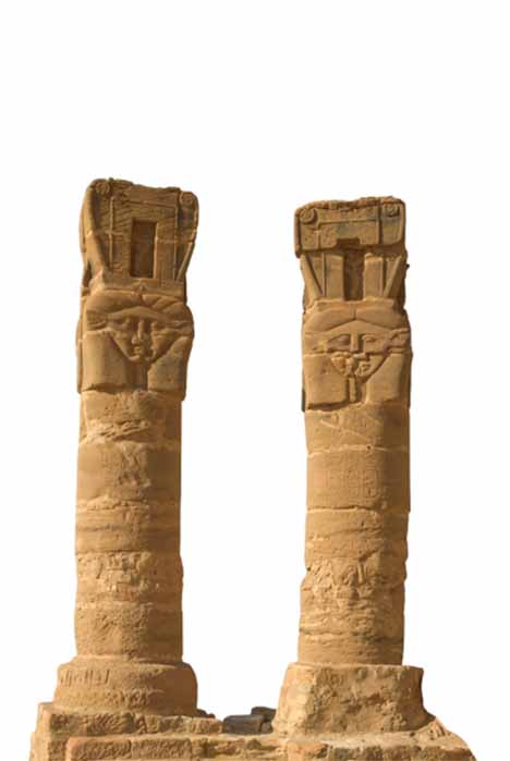 Hathor columns of the Temple of Mut (Jebel Barkal, Sudan) isolated on white background (Martina/ Adobe Stock)