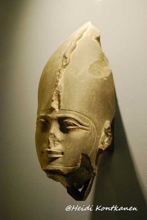 Head of Osiris, Lord of the Underworld, dating to the Twenty-Sixth Dynasty. Every person became Osiris in death. Louvre Museum, Paris.