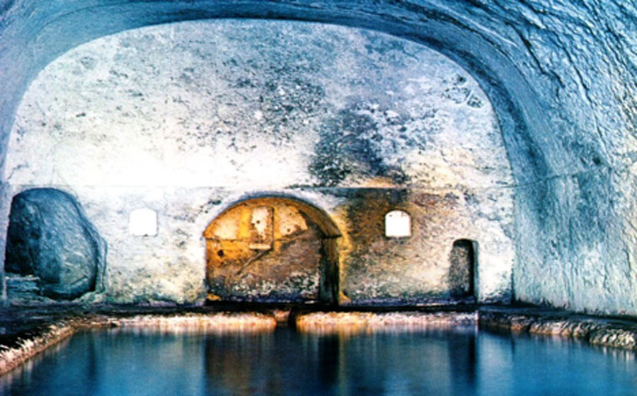 Interior of the Pilate Caves, with the fish pond, ledge for the priest and niche for the deity (Image: Courtesy Dr Roberto Volterri & barcaioliponza)