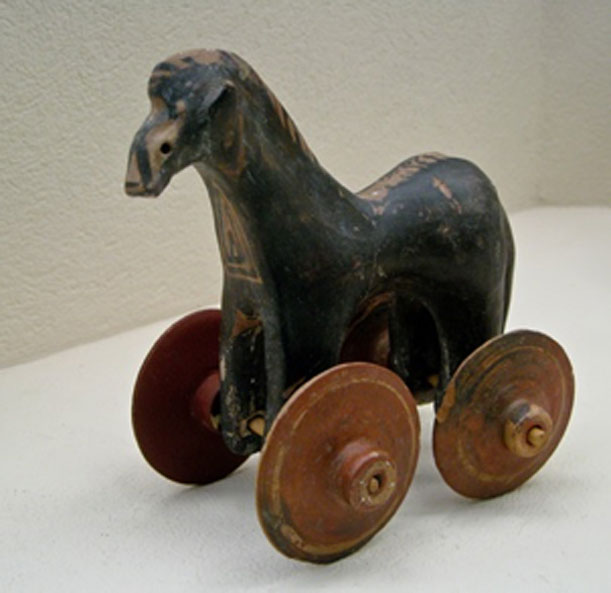 Little horse on wheels (Ancient Greek child's Toy). From tomb dating 950-900 BC. Kerameikos Archaeological Museum in Athens. (Public Domain)