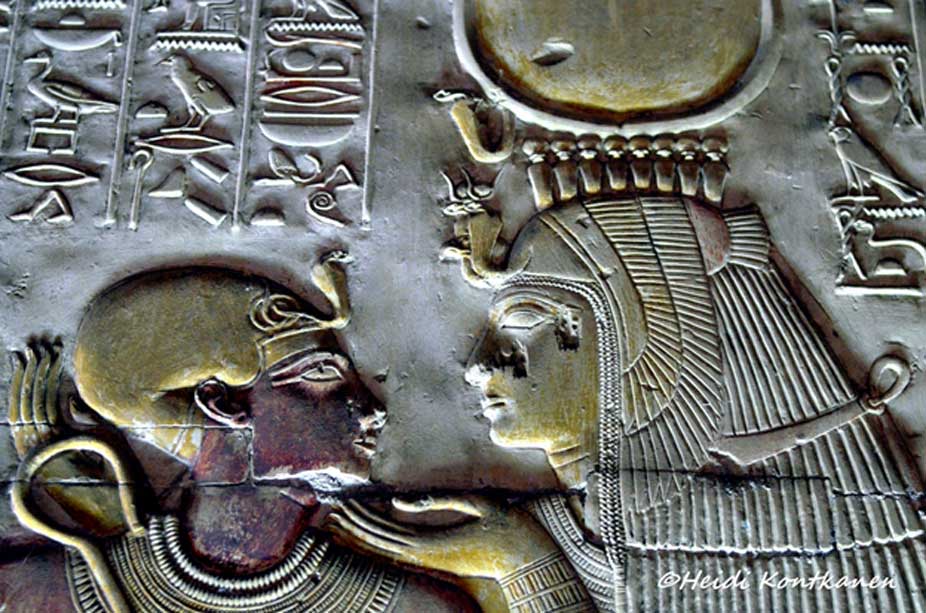Mother Love: Detail from a relief shows Pharaoh Seti I as a child sitting on the lap of goddess Isis. Her right arm is resting on his back while she gently caresses his face with her left hand. This scene can be found on the western wall of the Second Hypostyle Hall. Temple of Seti I, Abydos.