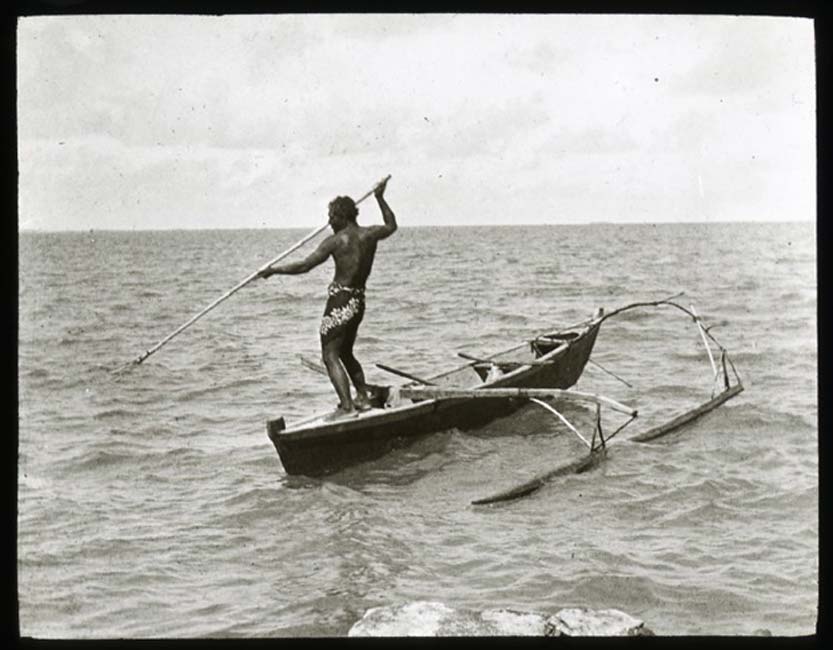 Polynesian outrigger canoe at sea (Public Domain)
