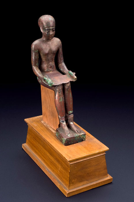 Seated bronze statuette of Imhotep (‘the one who comes in peace’); chancellor to the pharaoh Djoser, priest of Ra and architect. Egyptologists ascribe to him the design of the Step Pyramid at Saqqara. Outside the Egyptological community, he is referred to as a polymath, poet, judge, engineer, magician, scribe, astronomer, astrologer, and especially a physician. He later achieved the status of a deity and was identified with the Greek god Asklepios. (Public Domain)