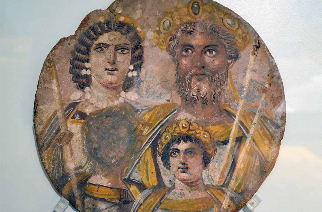 Severan Tondo depicting Septimius Severus, Julia Domna, Caracalla, and Geta (with his face removed in damnatio memoriae). Source: Public domain