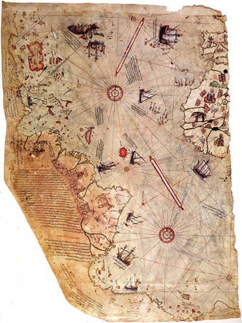 Surviving fragment of the Piri Reis map showing the Central and South American coast. The appended notes say "the map of the western lands drawn by Columbus” (Public Domain)