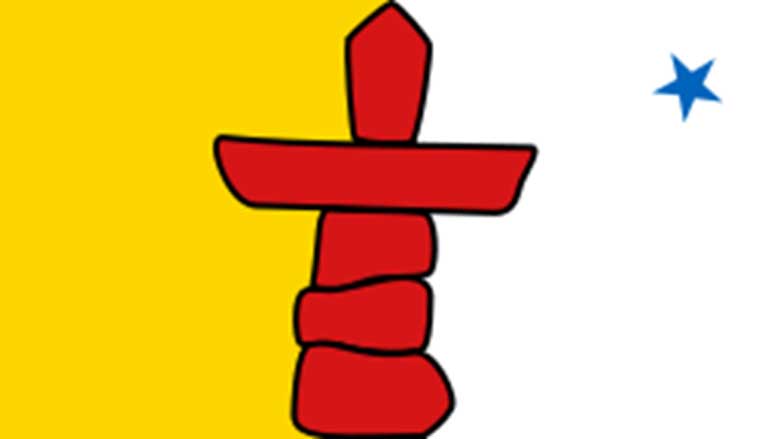 The official flag of Nunavut features a red inuksuk and a blue star, which represents the Niqirtsuituq, the North Star. Public Domain.