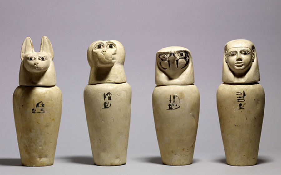 This set of canopic jars from Abydos contained the internal organs removed from the body during mummification. The four sons of Horus represented on the lids were believed to protect these organs. (Walters Art Museum)