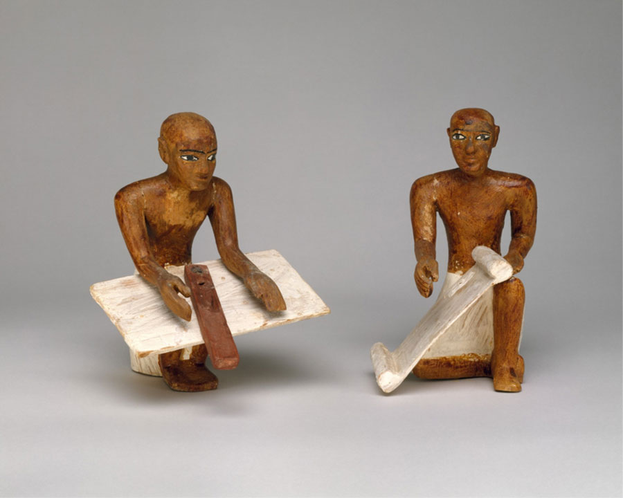 Two scribes from Meketre's Model Granary. Middle Kingdom, 12th Dynasty. Early reign of Amenemhat I. Wood, plaster, paint, linen. Southern Asasif, Tomb of Meketre (TT 280, MMA 1101), serdab, MMA excavations, (1920) Metropolitan Museum of Art, New York.