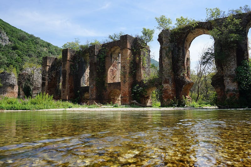 Ruins of a Roman aqueduct at Agio Georgios, Greece. 