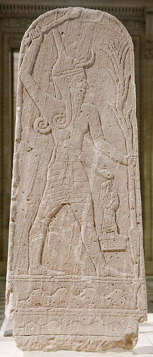 The Canaanite deity, Baal, in a smiting position.