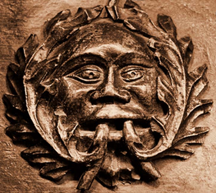 Detail of a ‘disgorging’ Green Man medieval misericor in Ludlow parish church. (Public Domain).