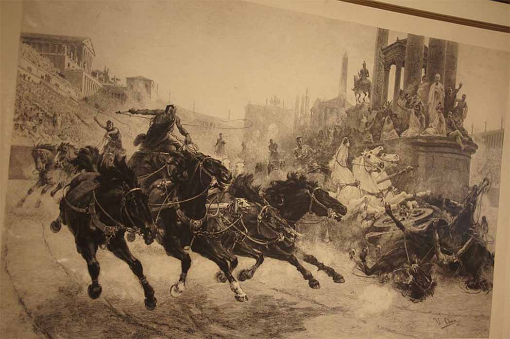 Depiction of the famous chariot race crash of Ben Hur (Carrera de carros romanos fotograbado) (Poniol/ CC BY-SA 3.0)
