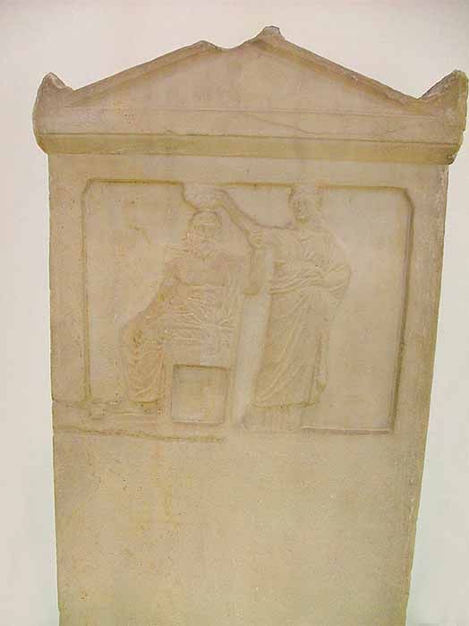 The relief representation depicts the personified Demos being crowned by Democracy (276 BC) Ancient Agora Museum (Jerónimo Roure Pérez/ CC BY-SA 4.0)
