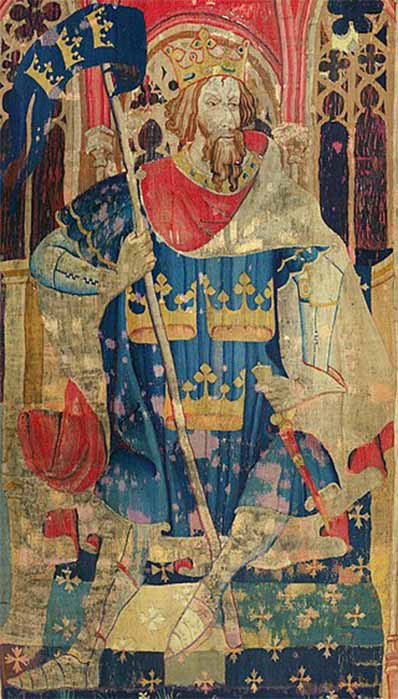 Tapestry showing Arthur as one of the Nine Worthies, wearing a coat of arms often attributed to him (c. 1385)(Public Domain)