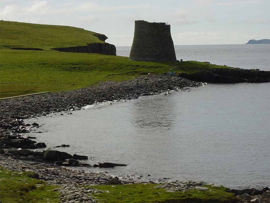 A brooding Mousa Broch, accessible by boat from Sandwick, Shetland. (Public Domain)
