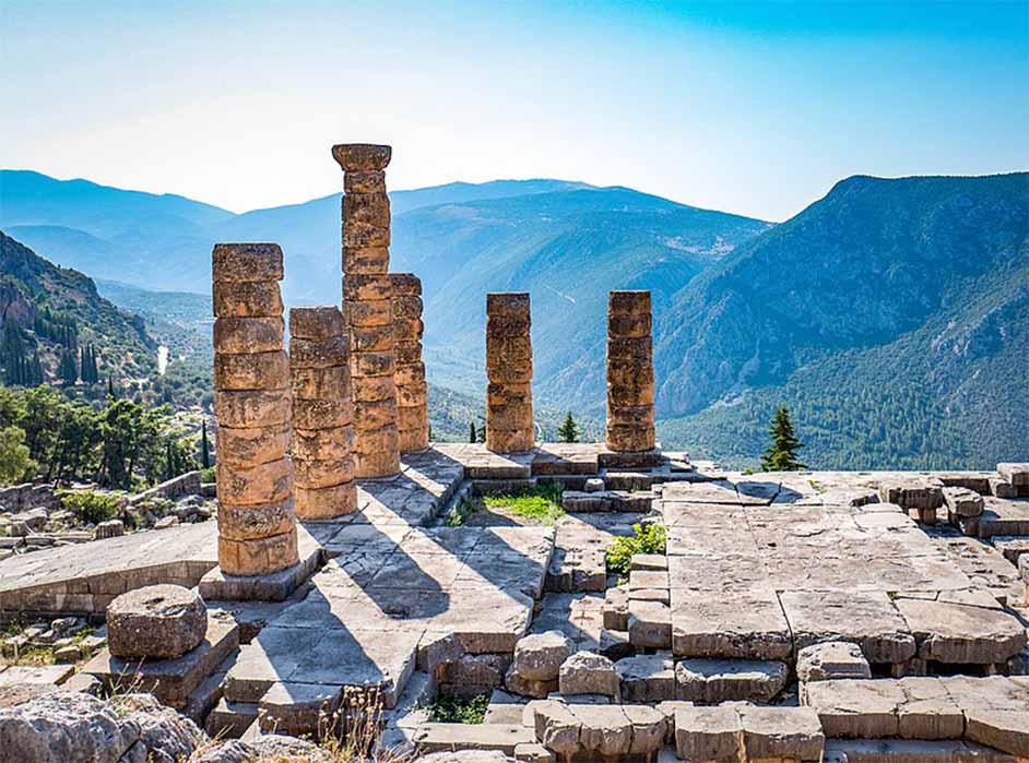 Ruins of the ancient Temple of Apollo at Delphi, overlooking the valley of Phocis ( Skyring/ CC BY-SA 4.0)