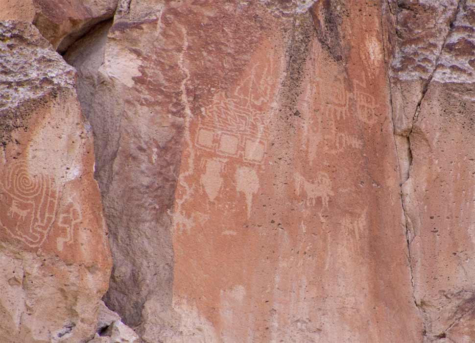 Located high up on a cliff face, the three squares in the center of the image have been interpreted as the three worlds of Fremont cosmology (underworld, material world, and upper world); Fremont Indian State Park. 