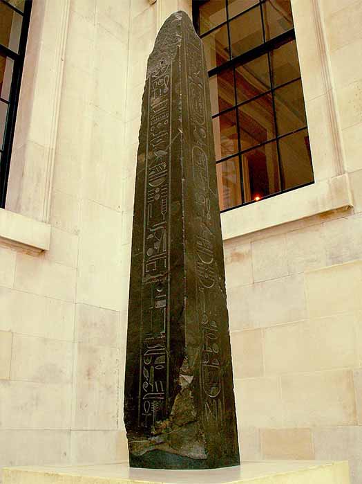 Black siltstone obelisk of King Nectanebo II. According to the vertical inscriptions he set up this obelisk at the doorway of the sanctuary of Thoth, the Thrice-Great, Lord of Hermopolis. British Museum, London (Public Domain)