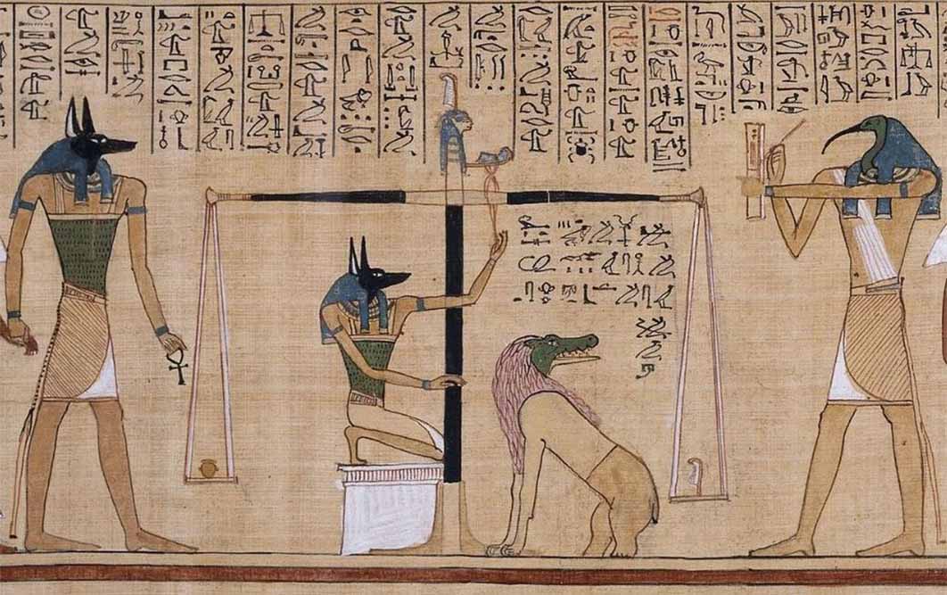 Detail from the Papyrus of Hunefer (c. 1275 BC) depicts the jackal-headed Anubis weighing a heart against the feather of truth on the scale of Maat, while ibis-headed Thoth records the result. Having a heart equal to the weight of the feather allows passage to the afterlife, whereas an imbalance results in a meal for Ammit, the chimera of crocodile, lion, and hippopotamus (Public Domain)
