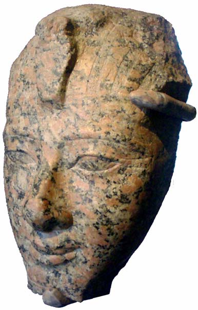 The faces on most statues of Amenhotep II differ slightly from those of his two immediate predecessors. This red granite face is not a portrait, but an official image conceived by the chief royal sculptors to communicate the ideal physical appearance of the king. Brooklyn Museum. (Photo: Keith Schengili-Roberts/CC BY-SA 2.5)