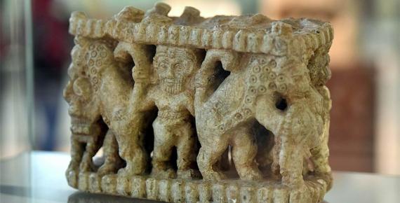 Sculpted scene depicting Gilgamesh wrestling with animals. From the Shara temple at Tell Agrab, Diyala Region, Iraq. Early Dynastic period, 2600–2370 BC. On display at the National Museum of Iraq in Baghdad. (Osama Shukir Muhammed Amin/ CC BY-SA 4.0)