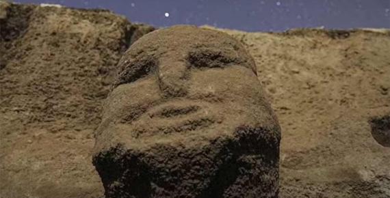 A human head in an ancient wall at the Karahan Tepe site in Turkey.  Source: Ancient Architects / YouTube screenshot