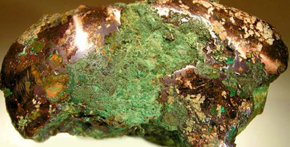 Native copper nugget from glacial drift, Ontonagon County, Michigan. An example of the raw material worked by the people of the Old Copper Complex. (Rob Lavinsky, iRocks.com/CC BY-SA 3.0);deriv.