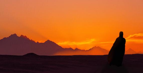 Deriv; Sunset in Egyptian desert with figure