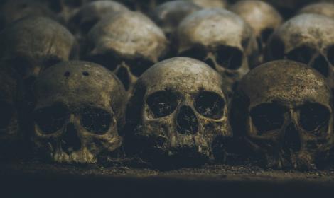 AI image of skulls in a catacomb.